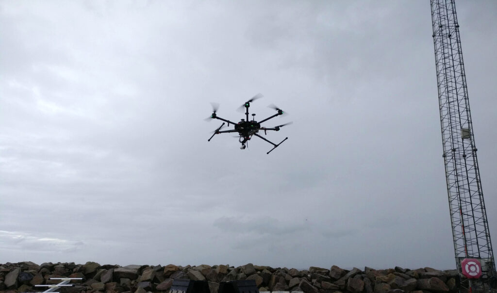Flying drone during survey