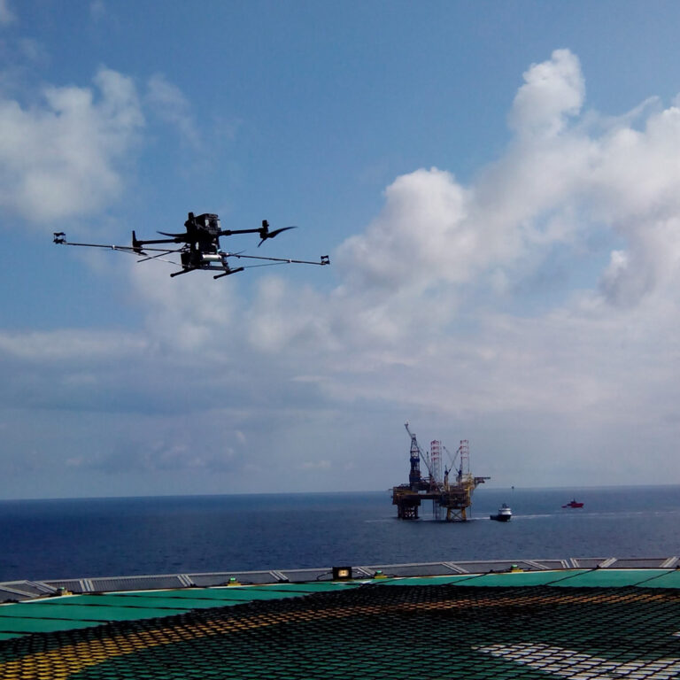 Drone flying at offshore platform